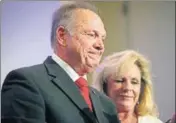 ?? AP ?? US Senate candidate Roy Moore with his wife Kayla Moore