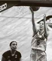  ?? Jessica Hill / Associated Press ?? UConn’s Paige Bueckers helped lead the Huskies’ rout in the Big East tournament quarterfin­als.