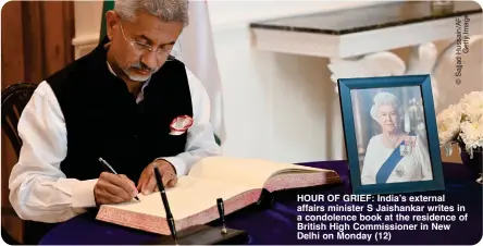  ?? ?? HOUR OF GRIEF: India’s external affairs minister S Jaishankar writes in a condolence book at the residence of British High Commission­er in New Delhi on Monday (12)