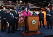  ?? (AP/Jacquelyn Martin) ?? House Speaker Nancy Pelosi speaks Thursday in Washington about the Congress Equality Act, with fellow Democratic lawmakers (from left) Sen. Cory Booker of New Jersey, Sen. Jerry Nadler of New York, Sen. Jeff Merkley of Oregon, Rep. David Cicilline of Rhode Island, Sen. Tammy Baldwin of Wisconsin and Senate Majority Leader Charles Schumer of New York.