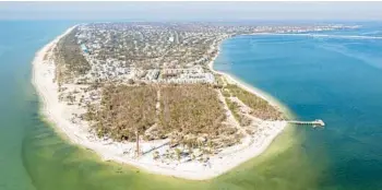  ?? CONNOLLY/ORLANDO SENTINEL PHOTOS PATRICK ?? Aerial photos show Sanibel Island on March 1, five months after Hurricane Ian made landfall in late September.