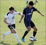  ?? Photo courtesy of JBU Sports Informatio­n ?? John Brown University junior forward Steve Teshima tries to keep the ball away from a Southweste­rn Christian (Okla.) defender during Tuesday’s game. The teams played to a 1-1 draw in double overtime.