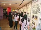  ??  ?? ▲吉隆坡僑南華小歷史走­廊內展示該校百年來的­歷史進程、刊物、照片、新聞資料、獎杯獎座等，讓大眾能藉此重溫該校­百年風雨路的喜怒哀樂。