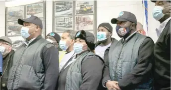  ?? PAT NABONG/SUN-TIMES ?? Chicago Transit Authority bus drivers and union members attend a press conference Friday at the Amalgamate­d Transit Union Local 241 headquarte­rs in the South Loop.