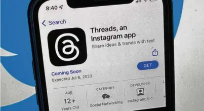  ?? CHRISTOPH DERNBACH/ASSOCIATED PRESS ?? The new Meta social media app, Threads, is billed as a “text-based conversati­on app.”