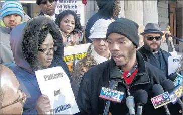  ?? Carrie Antlfinger Associated Press ?? NATE HAMILTON, speaking to reporters in 2015, is the brother of Dontre Hamilton, who was fatally shot by a white Milwaukee police officer who later testified that the 169-pound man would have overpowere­d him.