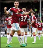  ??  ?? OPENER: Sam Vokes celebrates after he put Burnley 1-0 up at Turf Moor yesterday