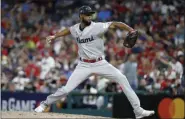  ?? JOHN MINCHILLO - THE ASSOCIATED PRESS ?? National League pitcher Sandy Alcantara, of the Miami Marlins, throws during the eighth inning of the MLB baseball All-Star Game against the American League, Tuesday, July 9, 2019, in Cleveland.