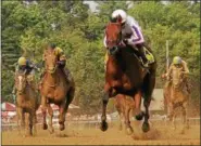  ?? DIGITAL FIRST MEDIA PHOTO ?? Dream It Is, with jockey Luis Contreras up, ran up the score with a big win in The Grade 3 Schuylervi­lle Stakes on Opening Day at the Saratoga Race Course on Friday.