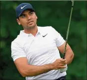  ?? SAM GREENWOOD / GETTY IMAGES ?? Jason Day (68-68—136) is three shots back at 8 under and is tied for fourth after the second round of the Memorial Tournament.