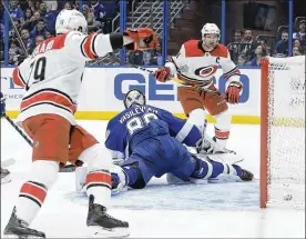  ?? DIRK SHADD / TAMPA BAY TIMES 2019 ?? Carolina’s Justin Williams (right) said the team has been told to tighten up their social circles to keep the Hurricanes from having an outbreak.