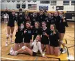  ?? SUBMITTED PHOTO ?? The Birmingham Marian volleyball team celebrates together after its five-set win over Farmington Hills Mercy in the CHSL Bishop Championsh­ip on Tuesday at Madison Heights Bishop Foley.