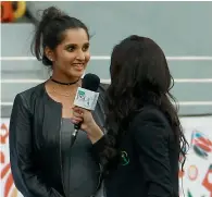  ??  ?? Sania Mirza speaks during a TV interview at the Dubai Internatio­nal Cricket stadium on Saturday.