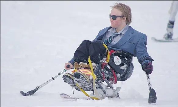  ?? — SARAHBURKE­FOUNDATION.COM ?? Landon McGauley says that he was able to make the transition from standup skier to sit-skier quickly.