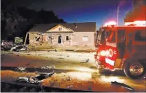  ?? Photo by Mike Bivins ?? A firetruck sits in front of a house destroyed by a suicide bomb attack July 13, 2016, in Panaca. Two explosions shattered the structure and sent shrapnel raining down on the small Lincoln County town 165 miles northeast of Las Vegas.