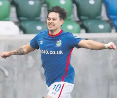  ??  ?? Treble top: Linfield’s Jordan Stewart celebrates scoring as he notches up a hat-trick on Saturday