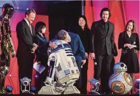  ?? EPA PIC ?? Star Wars actors Mark Hamill (fourth from right) and Adam Driver (second from right) on stage with director Rian Johnson (second from left) and producer Kathleen Kennedy (right) during a red carpet event for ‘Star Wars: The Last Jedi’ in Tokyo recently.