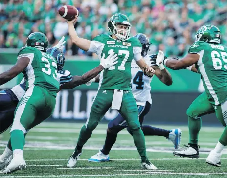  ?? BRANDON HARDER ?? Zach Collaros, No. 17, made his first start at quarterbac­k for the Saskatchew­an Roughrider­s as they hosted the Toronto Argonauts on Friday night in the season opener for each team, and led the men in green to a 27-19 victory in front of 29,788 screaming fans at Mosaic Stadium.