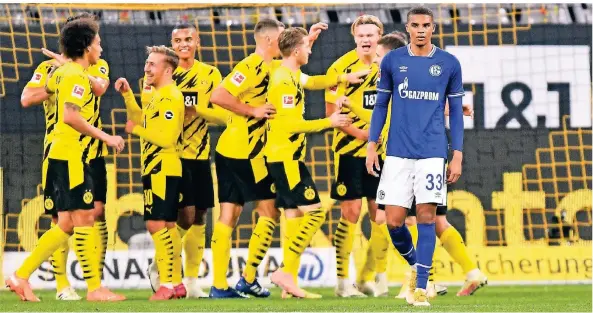  ?? FOTO: MARTIN MEISSNER/AP ?? Schalkes Malick Thiaw hatte im Revierderb­y im Gegensatz zu Dortmunds Spielern keinen Grund zur Freude.