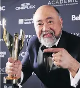  ?? PETER POWER/THE CANADIAN PRESS ?? Paul Sun-Hyung Lee of Kim’s Convenienc­e won as best comedy actor.