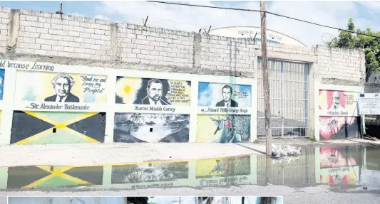  ?? PHOTOS BY GLADSTONE TAYLOR/MULTIMEDIA PHOTO EDITOR ?? Sewage settles alongside a wall bearing the images of historical political figures, including two of Jamaica’s national heroes, near the gate of Calabar Infant, Primary and Junior High School on Sunday. The pool, located at the intersecti­on of East Queen Street and Gold Street, traced back to an overflowin­g manhole at the intersecti­on of Sutton Street and Smith Lane.