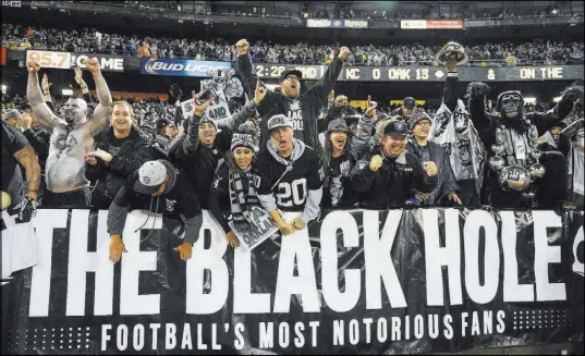  ?? KYLE TERADA/USA TODAY ?? The Black Hole fans celebrate everything about the Raiders, but East Bay fans are having a hard time being loyal with the thought of the team leaving Oakland for a second time.