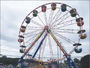  ?? Photos by Joseph B. Nadeau ?? Rockwell Amusements provided the rides, including the huge Feriss wheel.