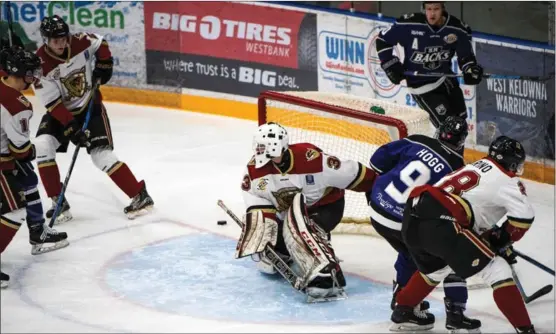  ?? JULIE PRINGLE/Snap Photograph­y ?? West Kelowna Warriors goalie Nik Amundrud had a busy night Saturday stopping 34 shots in a 4-1 win over Salmon Arm Silverback­s.