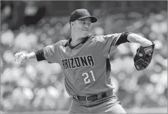  ?? FRANK FRANKLIN II/AP PHOTO ?? Arizona Diamondbac­ks pitcher Zack Greinke delivers during the first inning of Wednesday’s game against the New York Yankees at New York.