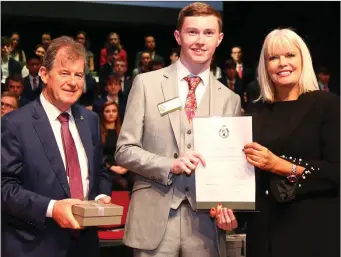  ??  ?? JP McManus, former St Brendan’s College student Darren Crowley, and Minister Mary MitchellO’Connor.