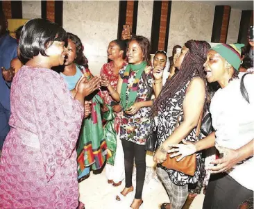  ?? -Pictures by THOMAS NSAMA ?? First Lady Esther Lungu being welcomed by Zambians upon arrival in Senegal for the fifth edition of Merck Africa Luminary which was held at the Centre Internatio­nal De Conference Abdou Diouf in Dakar, Senegal