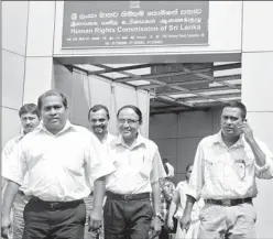  ??  ?? Members of the parents and teachers collective including CTU General Secretary Joseph Stalin seen leaving the SLHRC after the inquiry yesterday.
Pic by Pradeep Dilrukshan­a