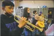  ?? ?? Questa Middle School mariachi band members practice Monday (Nov. 8) at Questa Junior/Senior High School.