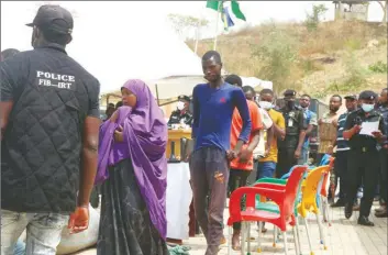  ??  ?? Suspected bandit, armed robbers, illegal drugs dealers and gun runners being paraded by police at the defunct SARS office in Abuja… yesterday.