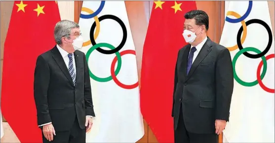  ?? ZHANG LING / XINHUA ?? President Xi Jinping meets with Thomas Bach, president of the Internatio­nal Olympic Committee, at the Diaoyutai State Guesthouse in Beijing on Jan 25.