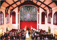  ?? [PHOTO BY J MANESS, FOR THE OKLAHOMAN] ?? The chapel at First Baptist Church of Oklahoma City, 1201 N Robinson, with its multiple stained glass windows and archways, is a popular site for weddings of 275 or less.