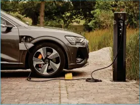  ?? Photo: Contribute­d ?? With the very first DC 200kW ultra-fast charger in South Africa the EV battery of an Audi e-tron GT can be recharged within 15 minutes.