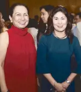  ??  ?? BPI area business director for Taguig Virginia Monfort and relationsh­ip manager Encarnita Siongco.