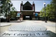  ?? MATT ROURKE — THE ASSOCIATED PRESS ?? This Thursday photo shows a placard where a Campbell Soup statue was situated in front of the Campbell’s Field in Camden, N.J. The baseball stadium that was hailed as a sign of the bright future of the waterfront in the povertystr­icken city of Camden...