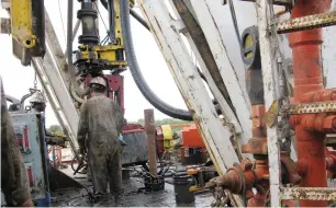  ?? — Reuters ?? Workers drill a horizontal well in the Wolfcamp Shale in west Texas Permian Basin.