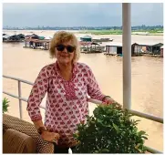  ??  ?? village people: Isabel Conway at one of Cambodia’s floating villages