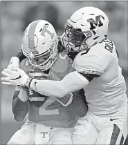  ?? AP/WADE PAYNE ?? Tennessee quarterbac­k Jarrett Guarantano (2) is sacked by Missouri safety Tyree Gillespie (9) in the Volunteers’ 50-17 loss to Missouri on Saturday in Knoxville, Tenn. Guarantano left the game with an injury and was replaced by Keller Chryst.