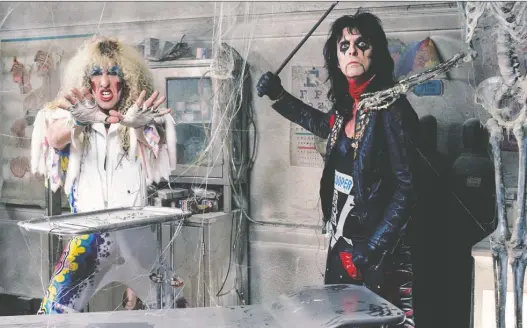  ?? PHOTOS: MARK WEISS ?? Among the many up close and personal photograph­s in the new hardcover coffee table book The Decade That Rocked is one of Dee Snider, left, and Alice Cooper in 1985.