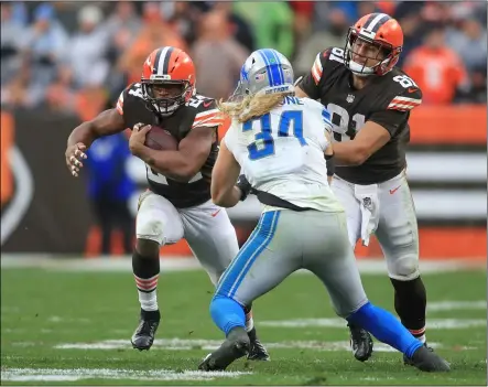  ?? TIM PHILLIS — FOR THE NEWS-HERALD ?? Nick Chubb runs upfield against the Lions during the Browns’ 13-10win on Nov. 21.