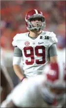  ?? Appalachia­n State and U. of Alabama Athletics ?? ( Appalachia­n State’s Taylor Lamb looks for open field during the Mountainee­rs’ bowl game last season. ( Alabama’s Adam Griffith lines up a field goal during the national championsh­ip game last January.