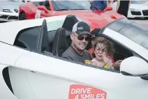  ?? STAR LIGHT CANADA ?? Mija Lamberson and Starlight children Malakai and Mathieu Lamberson enjoy the ride at the annual DRIVE 4 SMILES benefit event for Starlight Canada kicking off at Maserati Laval.