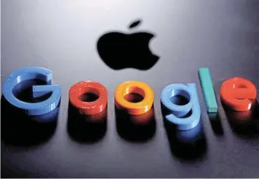 ?? REUTERS/Dado Ruvic ?? Beginning of the end:
A 3D printed Google logo is placed on the Apple Macbook in this illustrati­on from 2020./