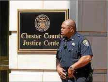  ?? MEDIANEWS GROUP FILE PHOTO ?? A Chester County Sheriff’s Deputy stands outside the Justice Center on West Market Street in West Chester.