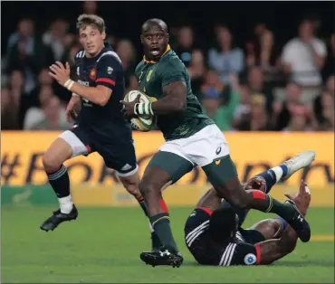  ?? Picture: EPA/GAVIN BARKER ?? SNIPING RUNS: Raymond Rhule evades a tackle from Virimi Vakatawa of France.