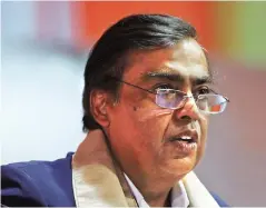  ?? PHOTO: REUTERS ?? Mukesh Ambani-led Reliance Industries would raise the loan in two tranches, $815 million in US dollars and ^150 million; its telecom arm, Jio would raise $1.5 billion, which would be guaranteed by the parent company